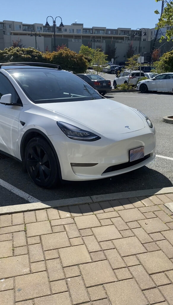 A picture of the Tesla that we got to drive during one of our pet sits with Trusted Housesitters.