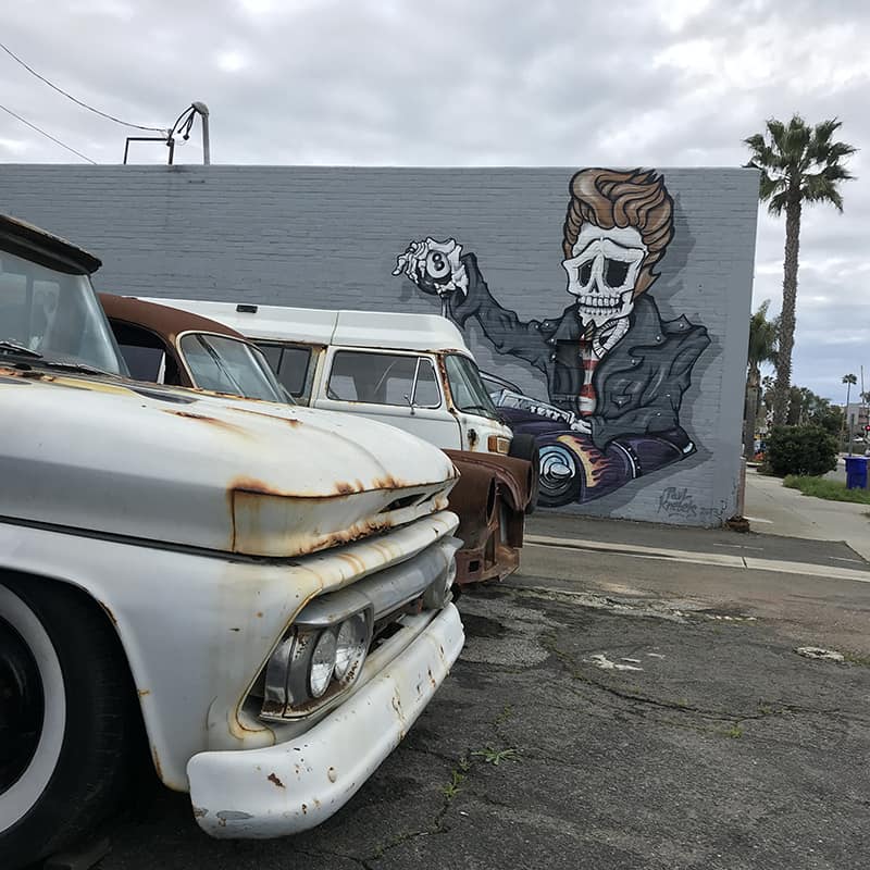 Exploring neighbourhoods in California like locals and taking pictures of old trucks and graffiti.